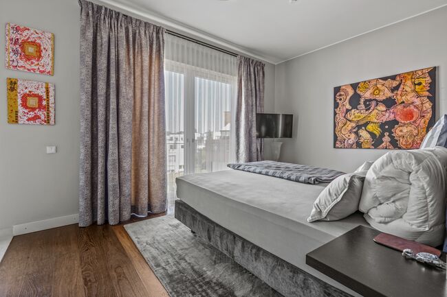 Schlafzimmer mit Seeblick